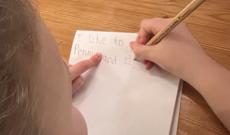 Child 1 writing b