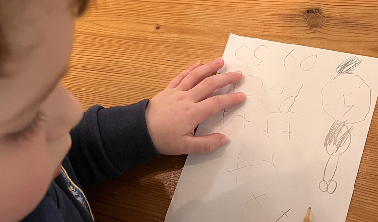 Child 2 writing a