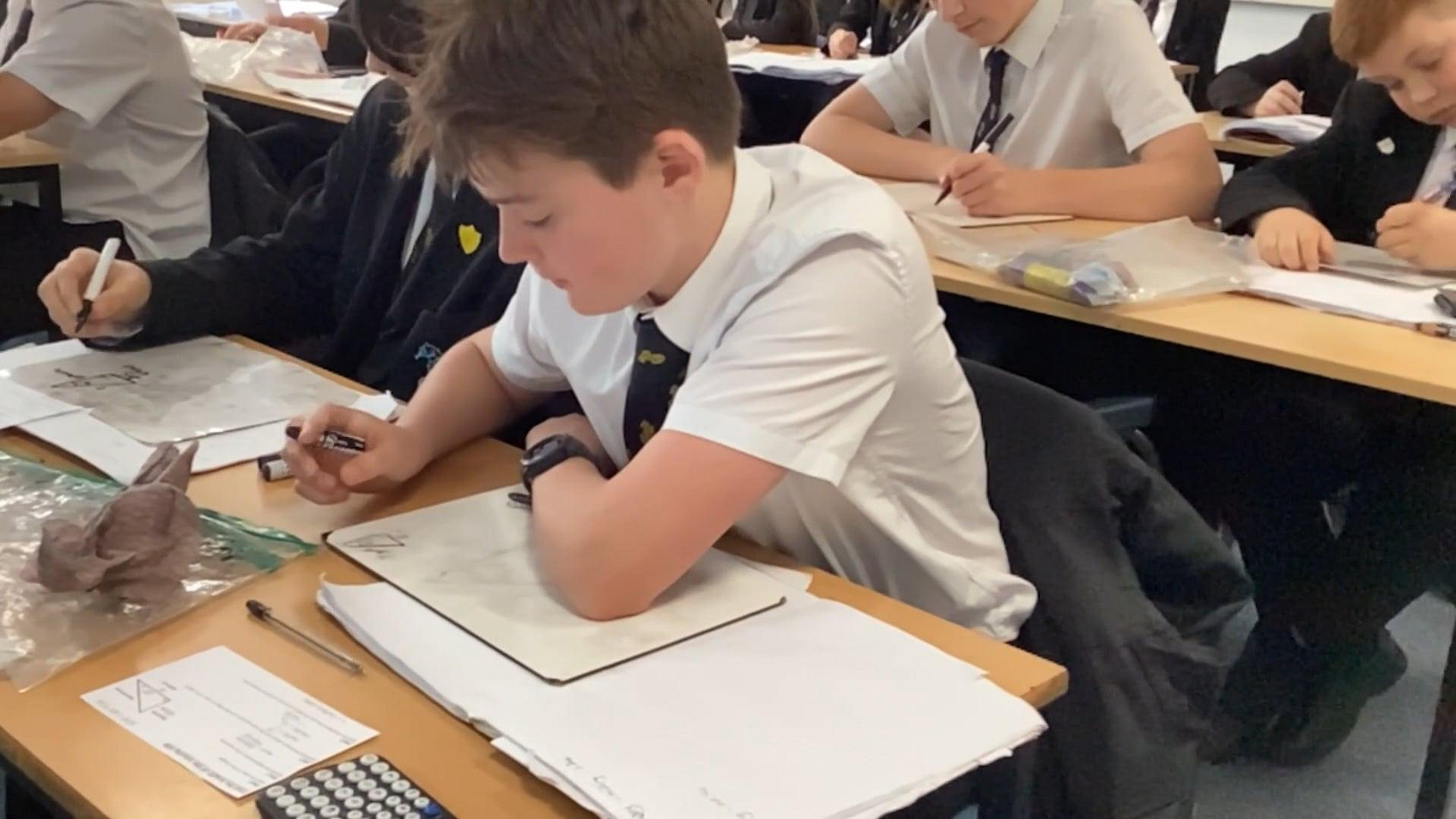 Using worked examples to reduce cognitive load in maths